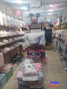 محل لبيع لوازم الرضيع وملابس الاطفال - السوق المفتوح